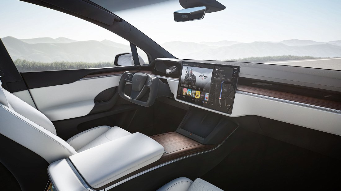 Tesla Model X Dual Motor (2021-…) интерьер, переднее сиденье, водительское сиденье, приборная панель, рулевое колесо, информационно-развлекательная система, кокпит