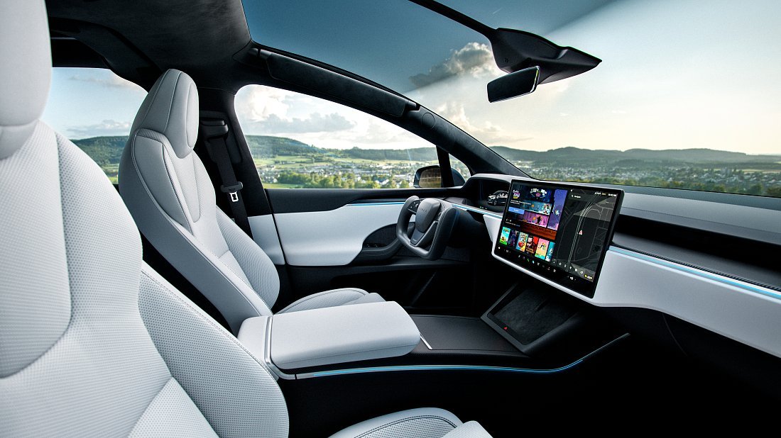 Tesla Model X Plaid (2025-…) интерьер, переднее сиденье, водительское сиденье, приборная панель, рулевое колесо, информационно-развлекательная система, кокпит