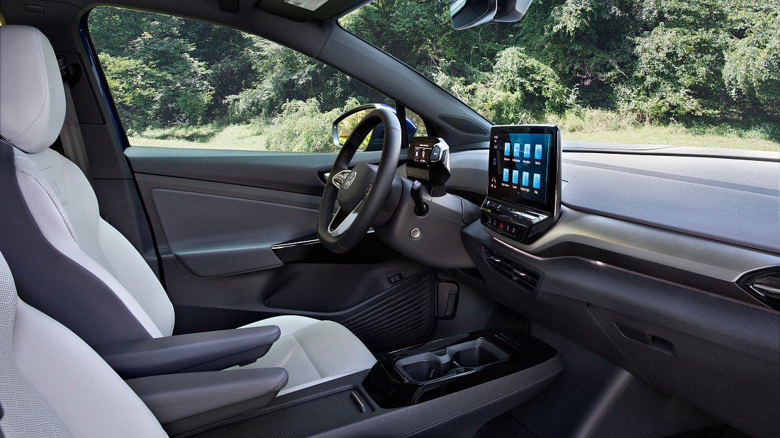 Volkswagen ID.4 Pro (2022-2023) интерьер, переднее сиденье, водительское сиденье, приборная панель, рулевое колесо, информационно-развлекательная система, кокпит
