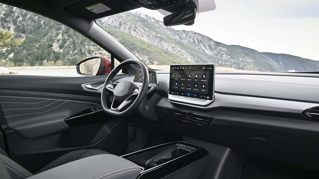 Volkswagen ID.4 AWD Pro (2024-…) интерьер, переднее сиденье, водительское сиденье, приборная панель, рулевое колесо, информационно-развлекательная система, кокпит