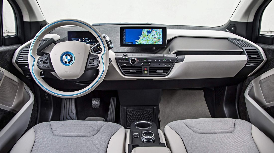 BMW i3 BEV 60 Ah (2013-2017) интерьер, переднее сиденье, водительское сиденье, приборная панель, рулевое колесо, информационно-развлекательная система, кокпит
