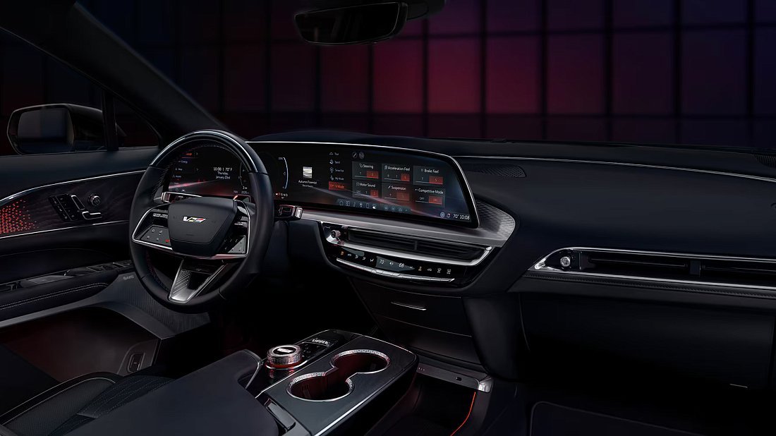 Cadillac Lyriq V (2025-…) интерьер, переднее сиденье, водительское сиденье, приборная панель, рулевое колесо, информационно-развлекательная система, кокпит