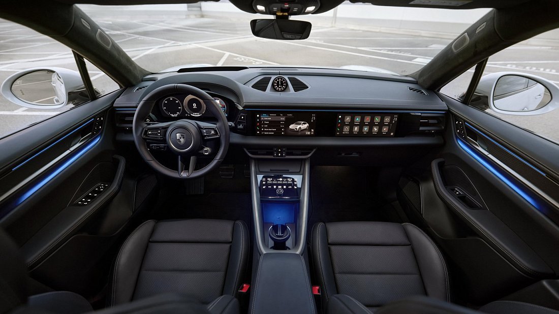 Porsche Macan Turbo Electric (2024-…) интерьер, переднее сиденье, водительское сиденье, приборная панель, рулевое колесо, информационно-развлекательная система, кокпит