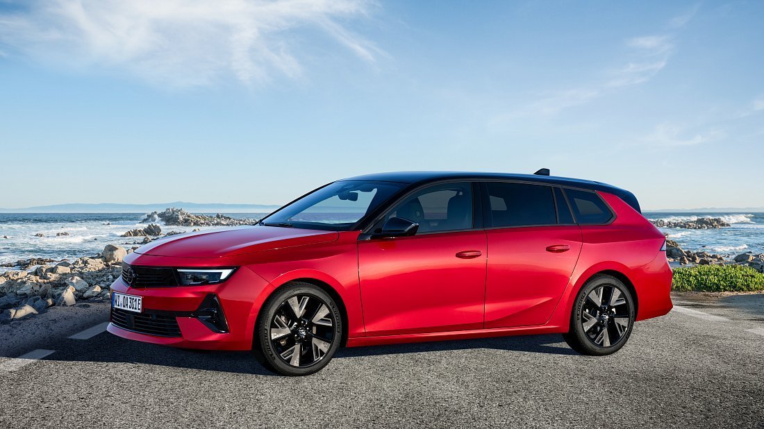 Opel Astra Electric Sports Tourer (2023-…) вид сбоку, силуэт, двери, колеса, экстерьер