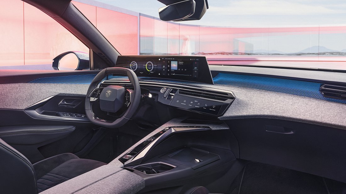 Peugeot e-3008 98 kWh Long Range FWD (2024-…) интерьер, переднее сиденье, водительское сиденье, приборная панель, рулевое колесо, информационно-развлекательная система, кокпит