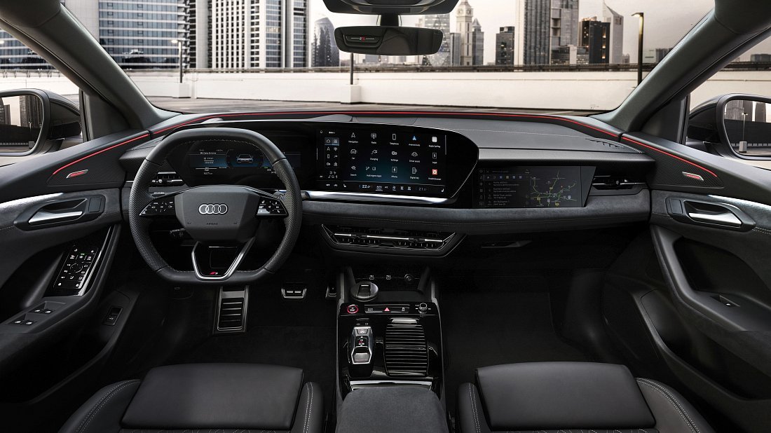 Audi Q6 Sportback e-tron quattro (2025-…) интерьер, переднее сиденье, водительское сиденье, приборная панель, рулевое колесо, информационно-развлекательная система, кокпит