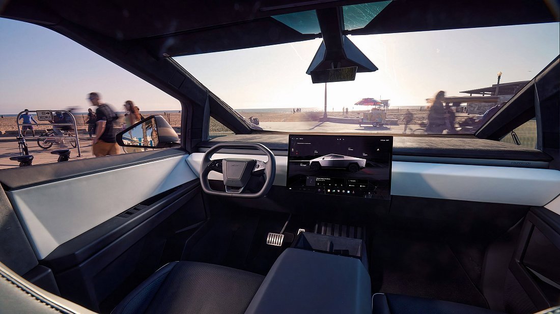 Tesla Cybertruck All-Wheel Drive (2023-…) интерьер, переднее сиденье, водительское сиденье, приборная панель, рулевое колесо, информационно-развлекательная система, кокпит