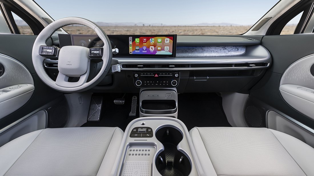 Hyundai Ioniq 9 Long Range AWD (2025-…) интерьер, переднее сиденье, водительское сиденье, приборная панель, рулевое колесо, информационно-развлекательная система, кокпит