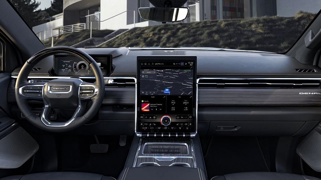 GMC Sierra EV Denali Edition 1 (2024-2025) интерьер, переднее сиденье, водительское сиденье, приборная панель, рулевое колесо, информационно-развлекательная система, кокпит
