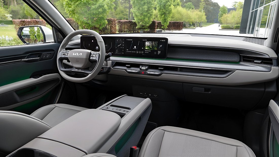 Kia EV9 Long Range AWD (2023-…) интерьер, переднее сиденье, водительское сиденье, приборная панель, рулевое колесо, информационно-развлекательная система, кокпит