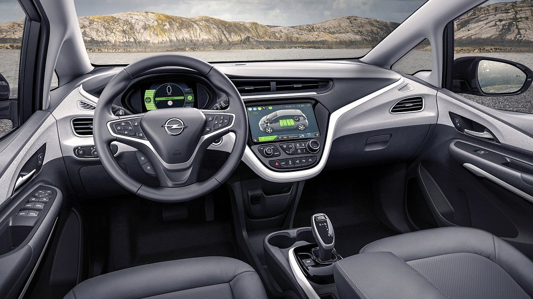 Opel Ampera-e Gen 1 (2016-2021) интерьер, переднее сиденье, водительское сиденье, приборная панель, рулевое колесо, информационно-развлекательная система, кокпит